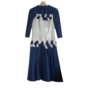 Hand-sewn vintage tailored dress size small in great condition worn only once